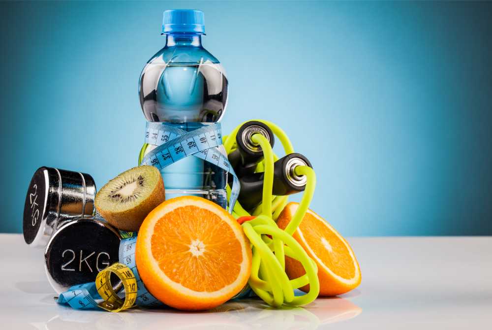 water dumbells orange and kiwi piled together