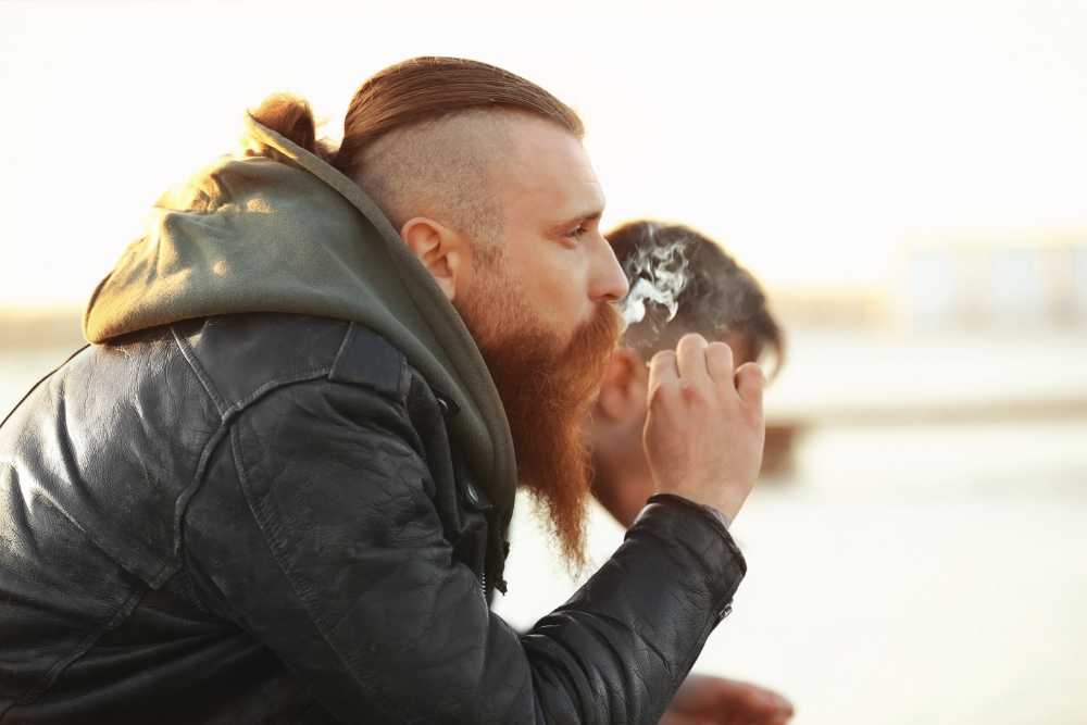 white man smoking cannabis