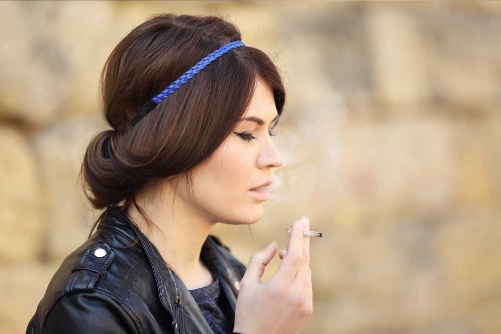 young woman smoking joint