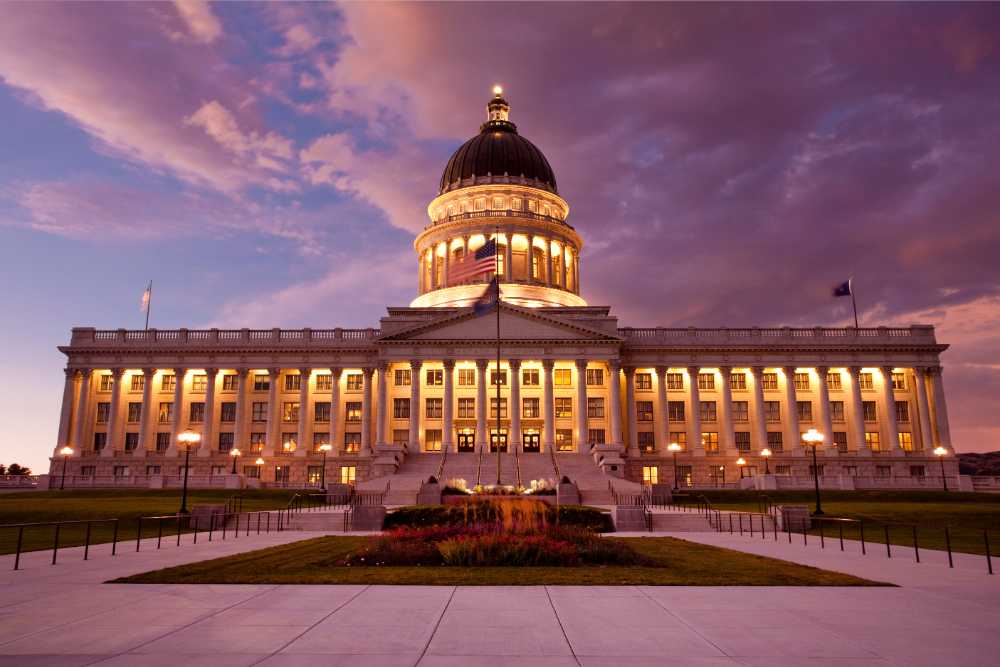 utah state capitol lit up at night