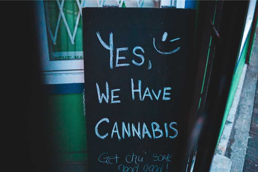 sign to cannabis shop yes we have cannabis